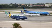  - 4 special paint aircraft lined up in a row - by Florida Metal