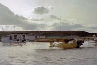  @ Q59 - From time to time, Fremont airport would go from a land base to a seaplane based airport. Unfortunately for Cub 30472, this was one of those times. The Fremont flight school is seen behind 472. They did not offer any floatplane instruction. - by S B J