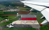  - Cargolux B747 maintenance center at ELLX / LUX. Photo taken on take off from rwy 24. - by Jean M Braun