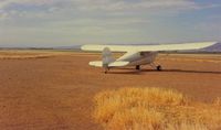  - 78E at a duster strip west of Woodland, Calif. (O41) that I would occasionally land at. Once landed my C150 and was rewarded with 2 nicks in the prop. Never did that again! - by S B J