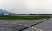  - Looking at the old Piper factory from across the airport. - by S B J