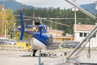  @ Prince Rupert/Seal Cove Water Airport - Unknown helicopter in general setting of dry-land part of airport. Canadian Coast Guard base in background. - by Remi Farvacque