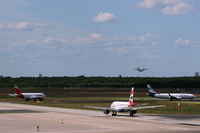  - In- and outbound traffic on rwys 08R und 08L.... - by Holger Zengler