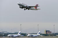  - Morning shuttle to CGN is passing by big babies on apron 3... - by Holger Zengler