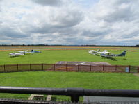  - grass apron in front of tower/cafe - by magnaman