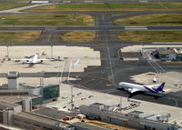  - Thai B777 being towed to/from parking slot - by Jean M Braun