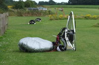  - Power-chute packed on the grass at Northrepps. - by Graham Reeve