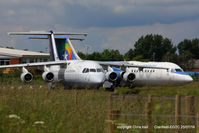  - BAe 146's stored at Cranfield - by Chris Hall