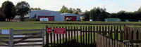  - Manchester City Airport, Barton EGCB - long distance view of the City Heliport - by Clive Pattle