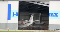  - A look into the J-MAX Bizjet hangar on the eastern side of the airport at Blackpool EGNH - by Clive Pattle