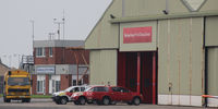  - Fire Station at Blackpool EGNH with the Offshore Terminal on its left. - by Clive Pattle