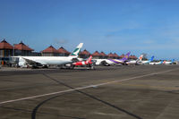  - Denpasar has become quite a busy airport: After holding for 30 minutes we finally landed, just to sit on the tarmac for another 30 minutes waiting for a gate to be available. My colleague experienced the same next day... - by Micha Lueck