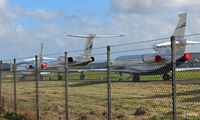 - Through the fence - Bizjets parked up on the taxyway at Dundee Riverside Airport EGPN for the Annual Dunhill Golf Championships, held at nearby St Andrews.  - by Clive Pattle