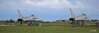  - Airfield action at RAF Lossiemouth EGQS during Exercise Joint Warrior 16-2. A pair of Typhoon GR4's behind the Runway Arrestor Gear - by Clive Pattle