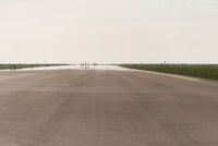  - Looking west down the south runway. - by Remi Farvacque