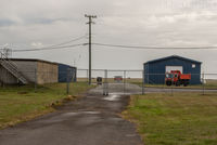  @ Sandspit Airport - Maintenance area. - by Remi Farvacque