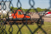  @ Fort Nelson Airport - View north of snow removal equipment in corporate/private hangar area. - by Remi Farvacque