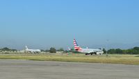  - Aircrafts American Airlines and Dominican Wings - by Jonas Laurince