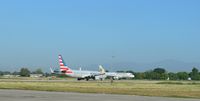  - Aircrafts American Airlines and Dominican Wings - by Jonas Laurince