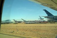  @ Pinal Airpark Airport - Taken through aircraft window whilst taxying past - by Keith Sowter