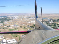  - Looking back at runways 10R & 10L from the radio compartment of a B-17. We have just taken off from RWY 28R. - by Gerald Howard