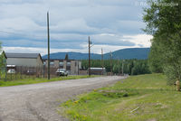  - View west down main service / access road. - by Remi Farvacque