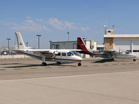  - Two Islanders awaiting passengers to the back country. - by Gerald Howard