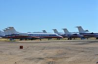  - Some of the many American Eagle Embraers stored in Kingman, AZ. - by FerryPNL