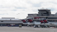  @ Pittsburgh International Airport - Two Delta CRJ-700's and two Delta MD-88's. - by Erik Fotorny