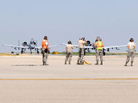  - Idaho ANG members awaiting A-10Cs on the east arm/de arm pad for pre flight checks. 190th Fighter Sq., 124th Fighter Wing. - by Gerald Howard