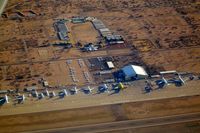  - Image taken through perspex window of aircraft whilst overflying / taxying around  - by Keith Sowter