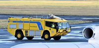  @ George Best Belfast City Airport - Carmichael Cobra no 1 in the City Airport Fire and Rescue fleet.  Air Alsie Dassault Falcon (OY-VIK) in the foreground. - by Albert Bridge