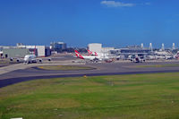  - QF maintenance base on the left, and QF domestic terminal on the right - by Micha Lueck