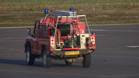  @ Turweston Aerodrome Airport - Fire Land Rover going to pick up some FOD from next to the runway - by Adam Loader