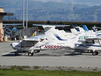  - Locally-based GA aircraft parked by general aviation terminal @ San Carlos Airport, CA  - by Steve Nation