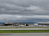  - General Aviation Ramp @ San Carlos Airport, CA on rainy February day - by Steve Nation