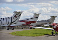  - A trio of Pilatus PC12s at Fairoaks. - by moxy