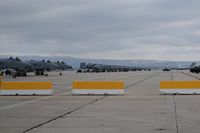  - Idaho ANG's A-10C are all parked with their guns facing away from the runways. Note Air Force One in background. A-10s are normally parked facing the runways. Secret Service didn't trust them. - by Gerald Howard