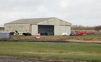  - Emergency services (police and air ambulance) helicopters at the Wales Air Ambulance base in Hangar 1. - by Roger Winser