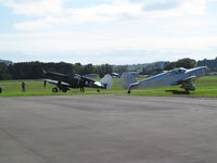  - couple of oldies outside new warbirds hangar - by magnaman