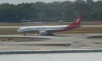 - Shanghai Airlines arrival at Changi Airport - by Bob Simmermon