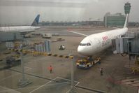  - Dragonair flight arriving at Hong Kong Intl'l - by Bob Simmermon