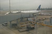  - UA896 preparing for the long flight from Hong Kong to Chicago O'Hare. - by Bob Simmermon