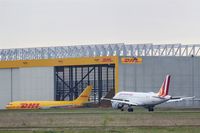  - Inbound traffic on rwy 08R passes DHL parcel freighter ..... - by Holger Zengler