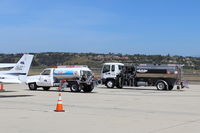  - Busy 100LL Fuel Trucks, at AOPA-FLY-IN - by Doug Robertson