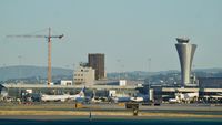  - Old towers being dismantled at San Francisco Airport. Tower on the left still has the old beacon. - by Clayton Eddy