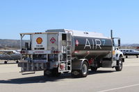  - AIR7 Fuel Truck, SHELL AVIATION 130 80 JET-A, busy with refueling arrivals-some from East Coast at AOPA-FLY-IN. - by Doug Robertson