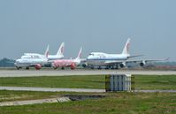  - Corrosion corner PEK with a B748 passing behind it. - by FerryPNL