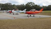  @ Spruce Creek Airport - Gaggle flight line up - by Florida Metal