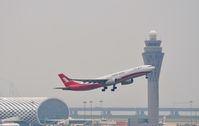  - Shanghai A333 lifting of in front of Shenzhen Airport tower. - by FerryPNL